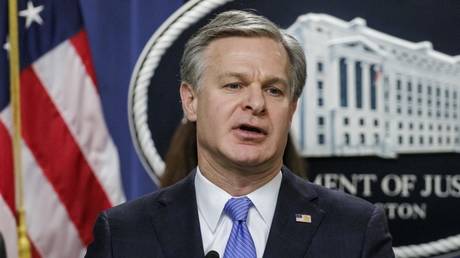 FBI Director Christopher Wray speaks during a press conference at the U.S. Department of Justice on December 6, 2023 in Washington, DC.