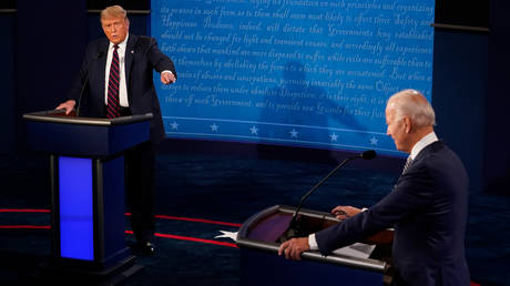 Donald Trump and Joe Biden speak during the first presidential debate at the Health Education Campus of Case Western Reserve University on September 29, 2020 in Cleveland, Ohio