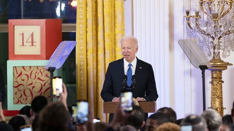 US President Joe Biden speaks during a Hanukkah holiday reception in Washington, DC, US, on December 11, 2023.