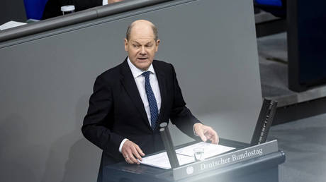 German Chancellor Olaf Scholz addresses the lawmakers in Berlin, Germany, on December 13, 2023.