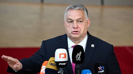Viktor Orban talks to the media after arriving at the European headquarters for the EU-Western Balkans summit in Brussels, Belgium, December 14, 2023