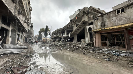 A view of demolished buildings after Israeli attacks in Gaza City, Gaza on December 13, 2023.