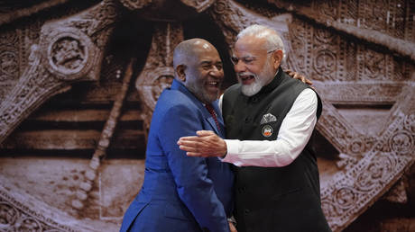 FILE PHOTO: Indian Prime Minister Narendra Modi (R) meets with the president of the Union of the Comoros, Azali Assoumani (L), G20 Summit, New Delhi, India, Sept. 9, 2023.