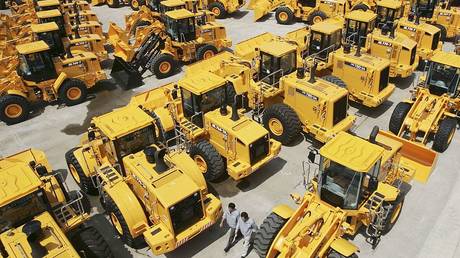 Hyundai excavators sit idle at a South Korean shipyard.