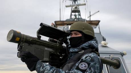 A Ukrainian serviceman holds a Stinger anti-aircraft weapon during a naval drill in the Black Sea, December 18, 2023.