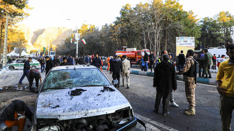 People gather at the site of an explosion in the city of Kerman, Iran, Jan. 3, 2024