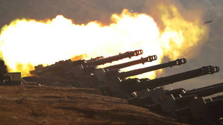 FILE PHOTO: A North Korean artillery unit holding fire drills.