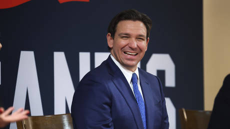 Republican presidential candidate Florida Governor Ron DeSantis speaks to guests during the Scott County Fireside Chat at the Tanglewood Hills Pavilion on December 18, 2023 in Bettendorf, Iowa