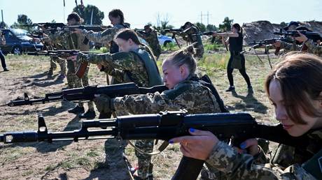 FILE PHOTO: Female cadets take part in weapons training on the outskirts of Kiev, Ukraine