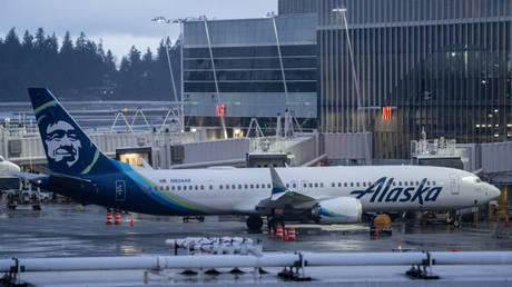 An Alaska Airlines Boeing 737 MAX 9 plane sits at a gate at Seattle-Tacoma International Airport on January 6, 2024 in Seattle, Washington, US