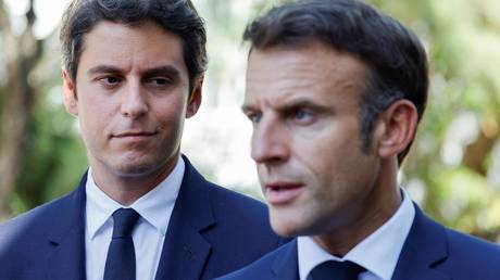 FILE PHOTO: Gabriel Attal (L) and President Emmanuel Macron (R), in September 2023.
