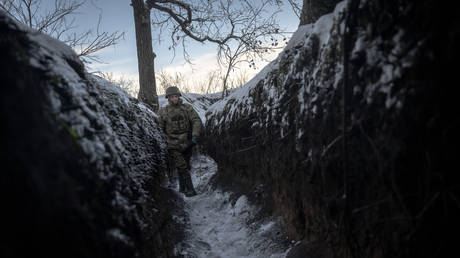 Ukrainian infantryman in a trench.