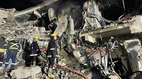 Teams carry out search and rescue operations after attacks in Erbil, Iraq on January 16, 2024.