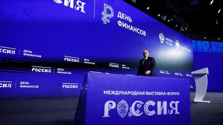 Russian Prime Minister Mikhail Mishustin leaves the stage after delivering a speech during a plenary session of the Finance Day, as part of the Russia Expo international exhibition and forum at the Exhibition of Achievements of National Economy (VDNKh) in Moscow, Russia.