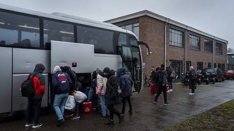 Asylum seekers arrive at a shelter in a student housing complex in Groningen, the Netherlands, December 8 2023
