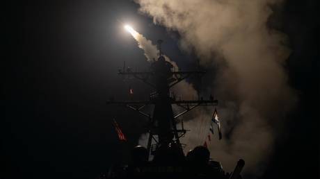 FILE PHOTO: The guided-missile destroyer USS Gravely (DDG 107) launches Tomahawk missiles against Yemen's Houthi rebels, January 12, 2024