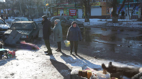 Residents of the city near the bodies of people who died as a result of the shelling of the AFU market in the Kirovsky district of Donetsk.