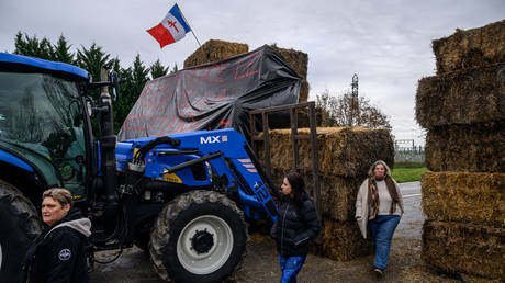 French farmers block a road leading to the Golfech nuclear power station near Toulouse.