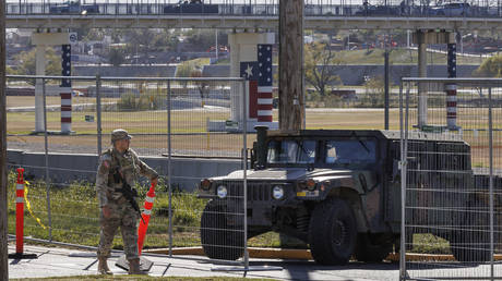 FILE PHOTO: Texas Dept. of Public Safety officers guard an entrance to a park near the US-Mexico border, Eagle Pass, Texas, January 11, 2024.