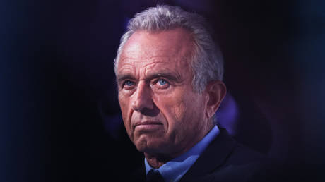 Robert F. Kennedy Jr. listens as he is introduced by Rabbi Shmuley Boteach during the World Values Network's Presidential candidate series at the Glasshouse on July 25, 2023 in New York City. Kennedy Jr