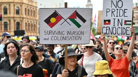 Protesters take part in the annual 'Invasion Day' march on Australia Day in Sydney, January 26, 2024.