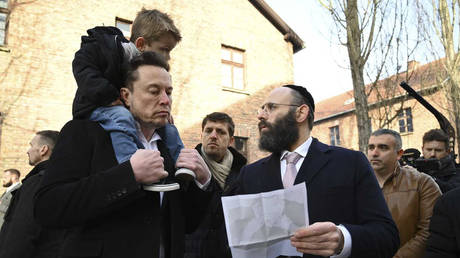 Tesla and SpaceX's CEO Elon Musk visits the site of the Auschwitz-Birkenau Nazi German death camp in Oswiecim, Poland, on Monday, January 22, 2024.