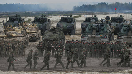 FILE PHOTO: Participants of a high-intensity training session, seen at the end of the exercise at the Nowa Deba training ground on May 06, 2023 in Nowa Deba, Poland.