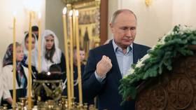 Putin celebrates Christmas with families of fallen soldiers