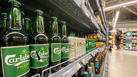 Russian beer giant ups ante in battle with former owner