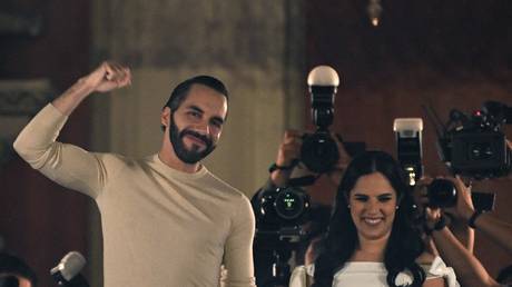 Salvadoran President Nayib Bukele greets supporters next to his wife Gabriela Rodriguez after the presidential and legislative elections in San Salvador on February 4, 2024.