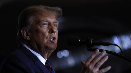 FILE PHOTO: Republican presidential candidate and former US President Donald Trump delivers remarks during his primary night rally at the Sheraton on January 23, 2024 in Nashua, New Hampshire.