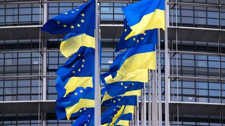 European Union's and Ukrainian flags fluttering outside the European Parliament in Strasbourg.
