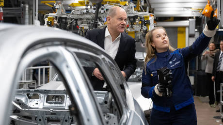 German Chancellor Olaf Scholz at a BMW plant in Munich, December 5.