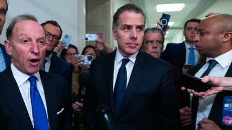 Hunter Biden, center, and his attorney Abbe Lowell, left, address the media after leaving the House Oversight and Accountability Committee on Wednesday, January 10, 2024