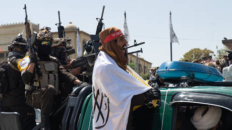 Taliban supporters hold a parade to mark two years since the group's return to power, August 15, 2023, Kabul, Afghanistan.