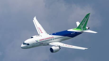 China's C919 performs a rehearsal flight during a preview of the Singapore Airshow on February 18, 2024 in Singapore