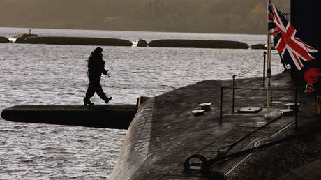 HMS Vanguard sits in dock at Faslane Submarine base on the river Clyde December 4, 2006 in Helensburgh, Scotland