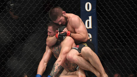 Khabib Nurmagomedov of Russia attempts to submit Conor McGregor of Ireland in their UFC lightweight championship bout during the UFC 229 event inside T-Mobile Arena on October 6, 2018 in Las Vegas, Nevada