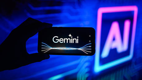 FILE PHOTO: Google Gemini logo is displayed on a smartphone with Artificial Intelligence symbol in the background.