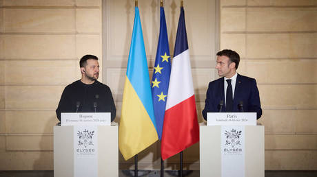 FILE PHOTO: French President Emmanuel Macron meets Ukrainian President Vladimir Zelensky in Paris, France, on February 16, 2024.