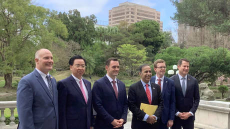 US Representative Mike Gallagher (third from left) heads a US delegation to Taiwan on Thursday in Taipei.