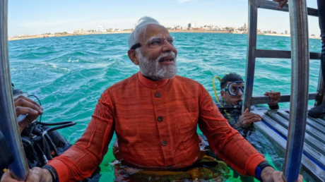 Indian Prime Minister Narendra Modi emerges after exploring a sunken section of the Indian holy city Dwarka