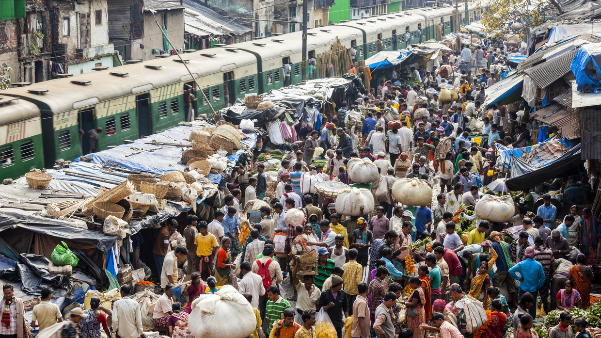 FILE PHOTO: A crowded train station in Kolkata, India