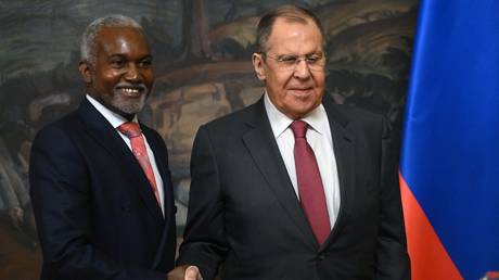 Nigerian Foreign Minister Yusuf Maitama Tuggar and Russian Foreign Minister Sergey Lavrov shake hands during a joint news conference following their meeting in Moscow, Russia.