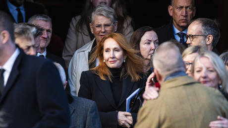 J.K. Rowling (C) attends a memorial service in Edinburgh, Scotland in December 2023.