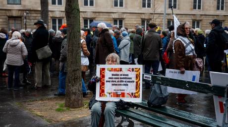 A woman participates in a pro-euthanasia demonstration in Paris on January 23, 2024.