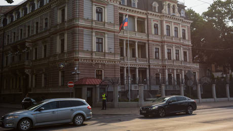 Cars drive by Russia's embassy in Riga, Latvia, August 7, 2019