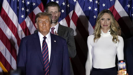 Donald Trump, Eric Trump, and Lara Trump attend a primary election night party in Nashua, New Hampshire, January 23, 2024