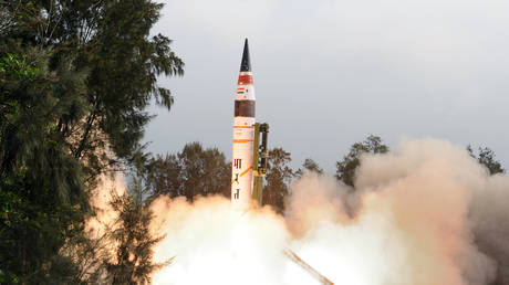 A long-range missile being fired off from a mobile launcher from Wheeler Island off the coast of India on April 19, 2012