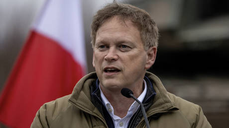 Britain's Secretary of Defense Grant Shapps speaks during a joint press conference with the Polish Defense Minister at a military training compound near Orzysz, North-eastern Poland, on March 13, 2024.